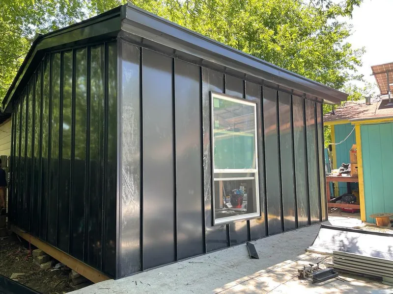 Black standing seam metal wall panels for Metal Roof Installation in Glasgow